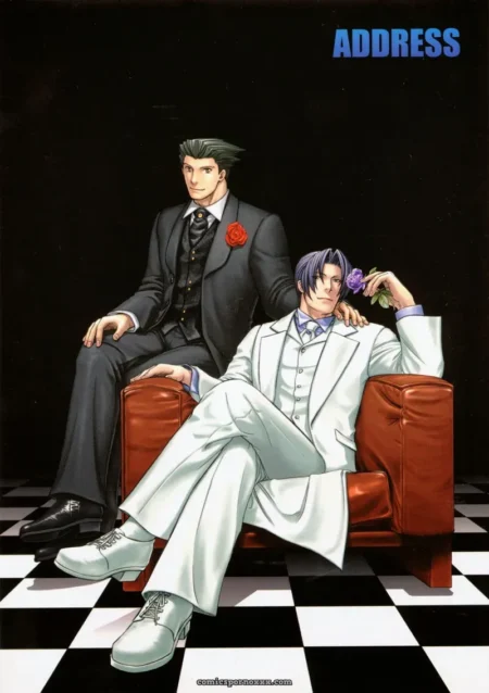 Black-suited man's hand under white-suited man's suit groping his cock while he holds purple flower on red couch checkered floor